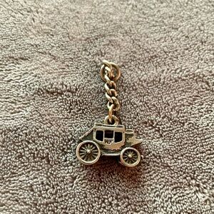 Wells Fargo stagecoach silver charm